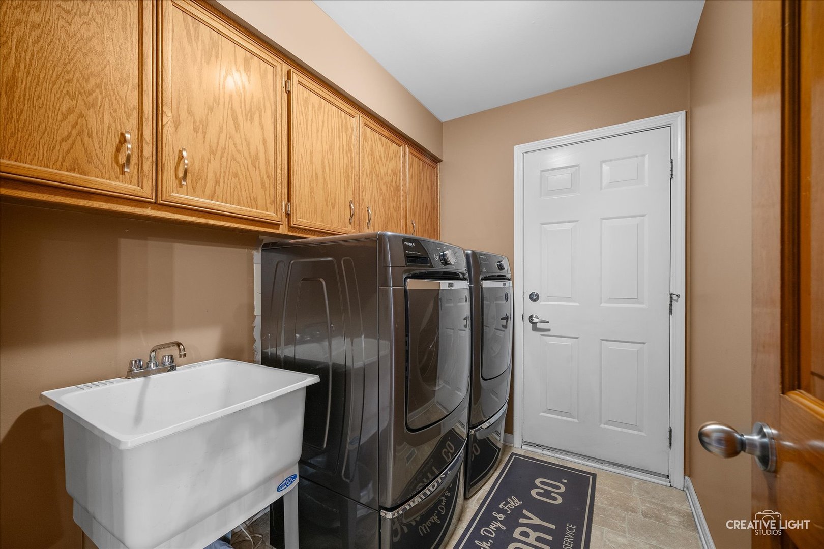 1185 Lewis Road Geneva, IL 60134 - Photo 13 of 28 a bathroom with a sink and a mirror