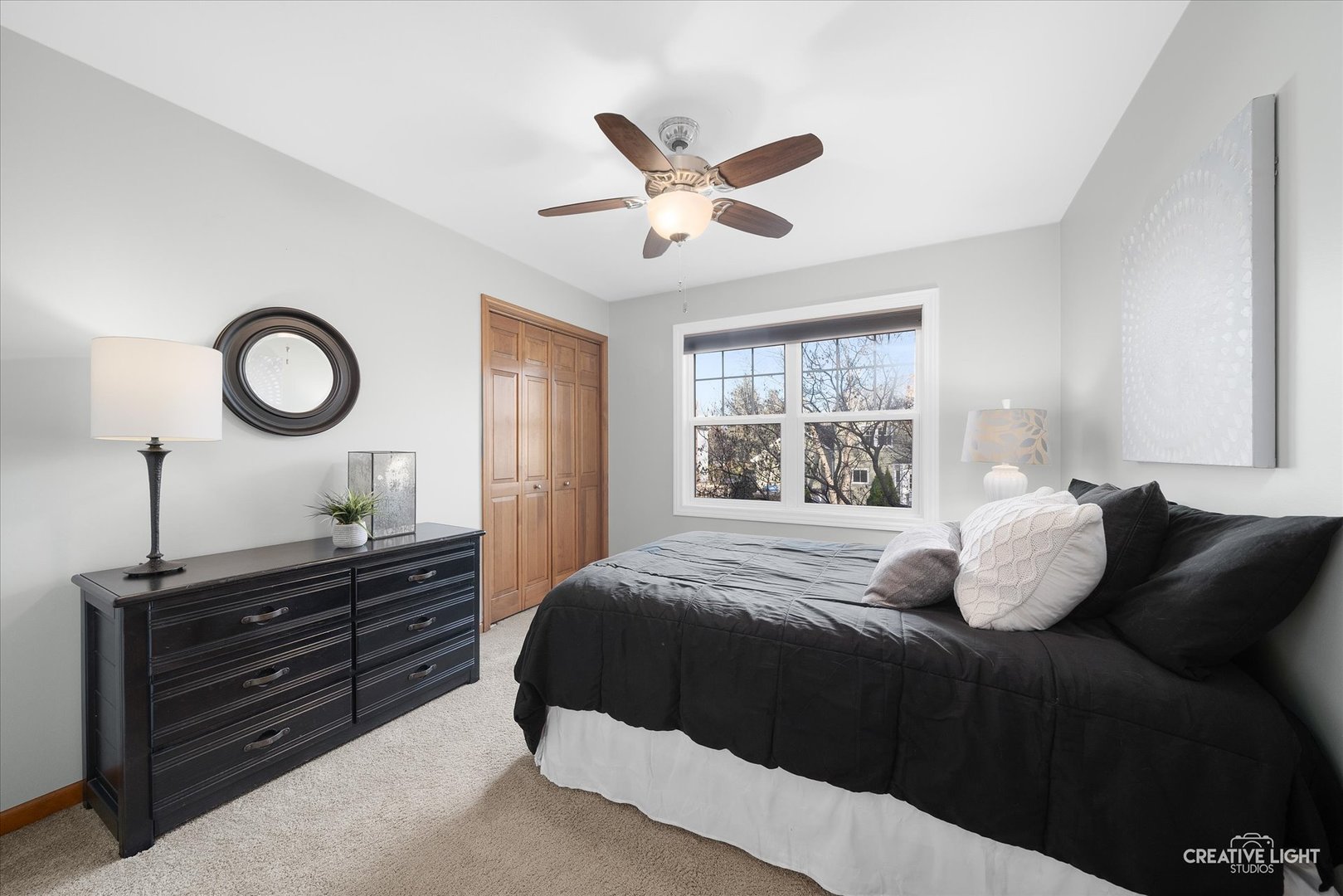 1185 Lewis Road Geneva, IL 60134 - Photo 16 of 28 a bedroom with a bed and window
