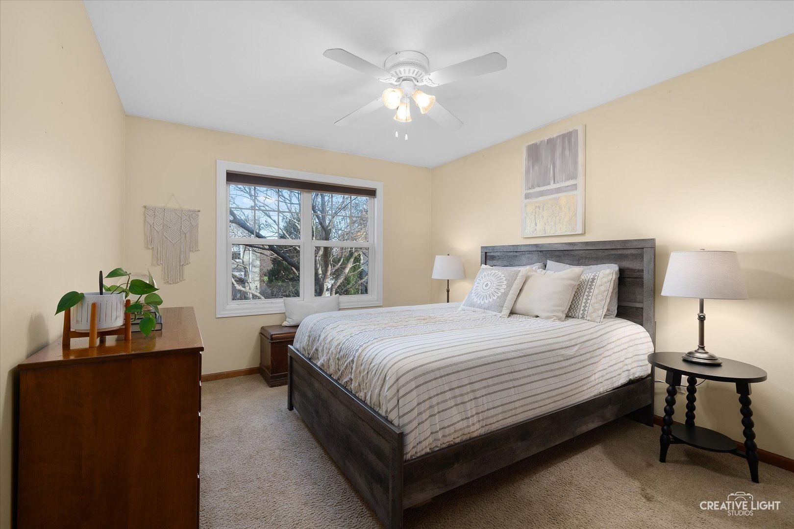 1185 Lewis Road Geneva, IL 60134 - Photo 17 of 28 a bedroom with a large bed and a window