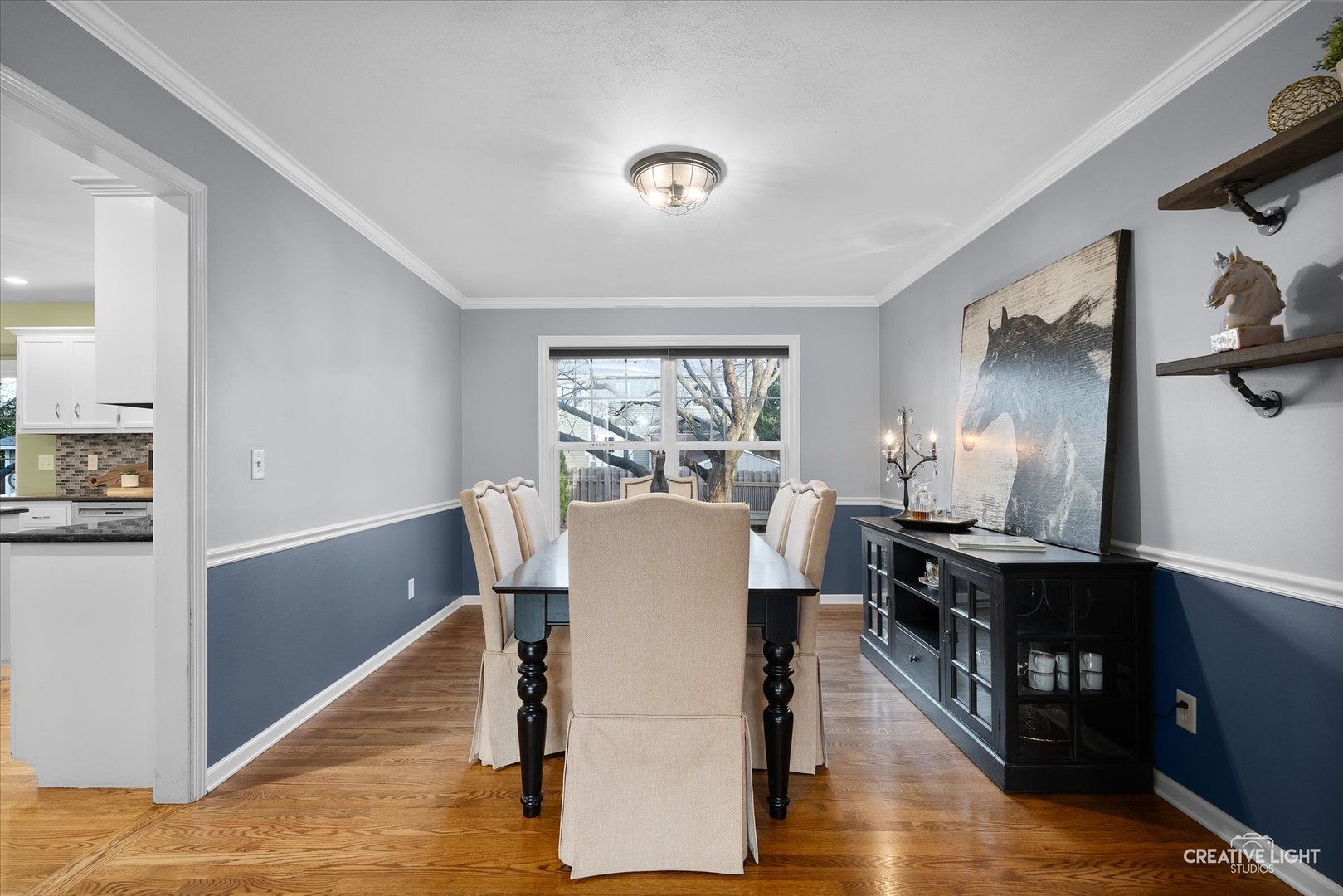 1185 Lewis Road Geneva, IL 60134 - Photo 10 of 28 a view of a dining room with furniture window and wooden floor