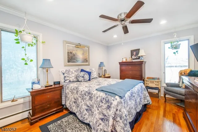 a bathroom with a granite countertop toilet a sink and a mirror