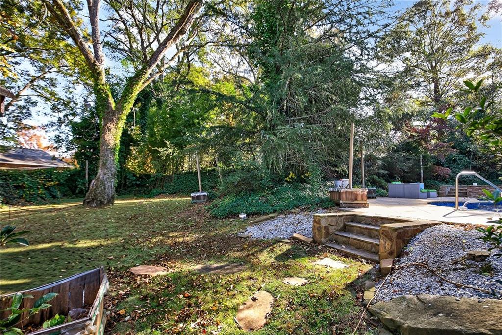 32 McDonough Street Hampton, GA 30228 - Photo 12 of 59 a view of a backyard with swimming pool