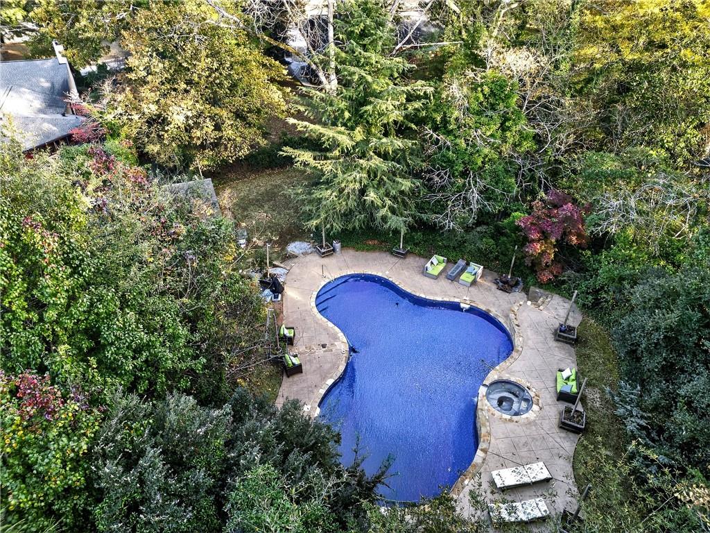 32 McDonough Street Hampton, GA 30228 - Photo 21 of 59 an aerial view of a house with a yard and garden
