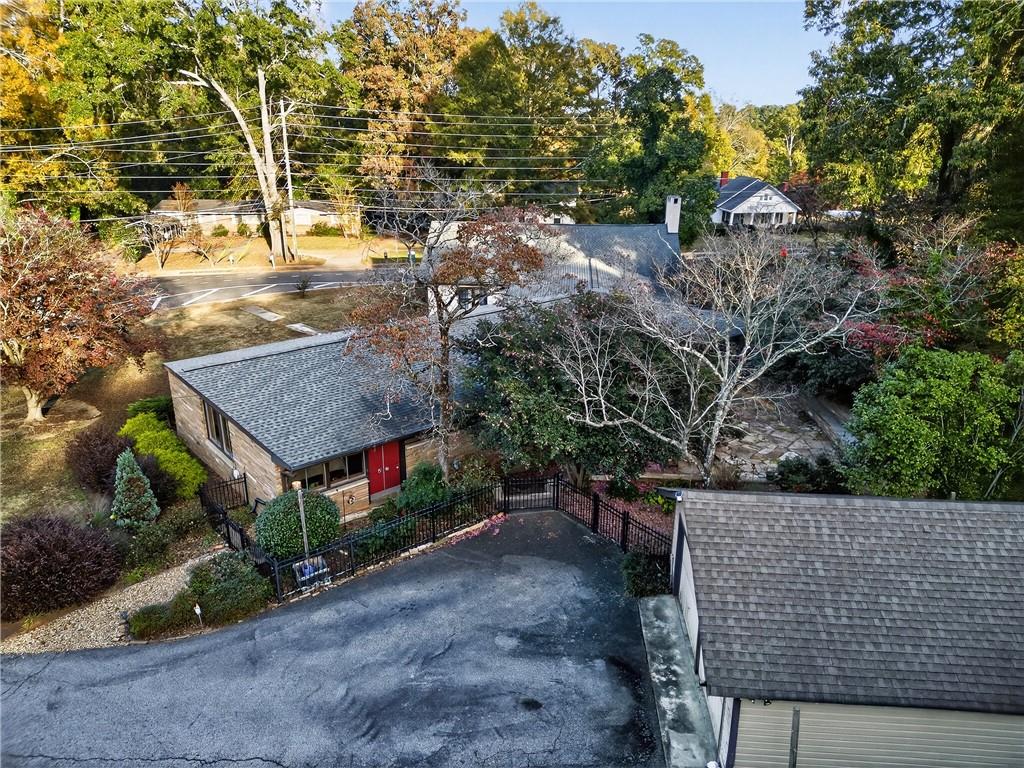 32 McDonough Street Hampton, GA 30228 - Photo 27 of 59 a aerial view of a house with a yard