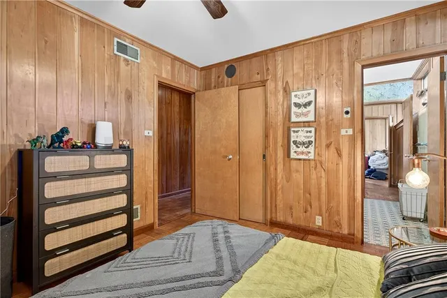 a view of a balcony with chair and front door