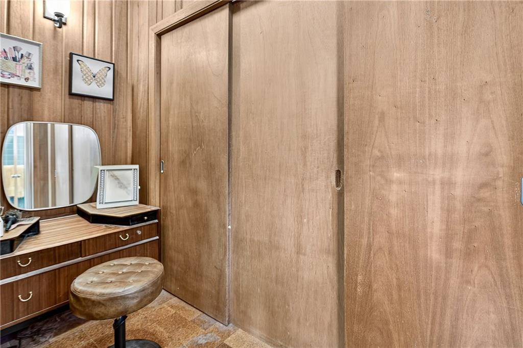 32 McDonough Street Hampton, GA 30228 - Photo 57 of 59 a bathroom with a shower curtain and a sink