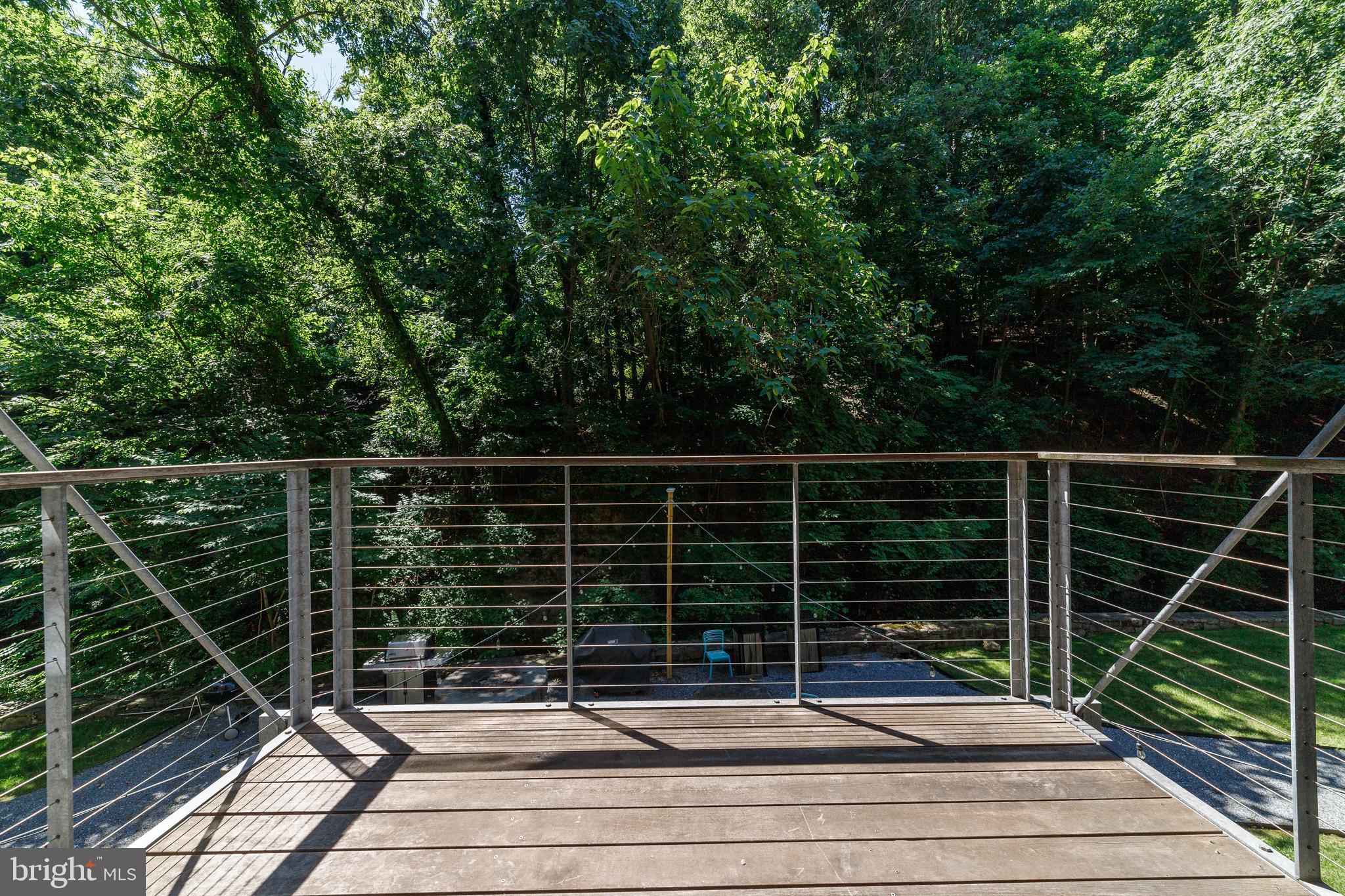 2007 Clipper Park Road, Unit 121 Baltimore, MD 21211 - Photo 32 of 34 Balcony overlooks woods and stream