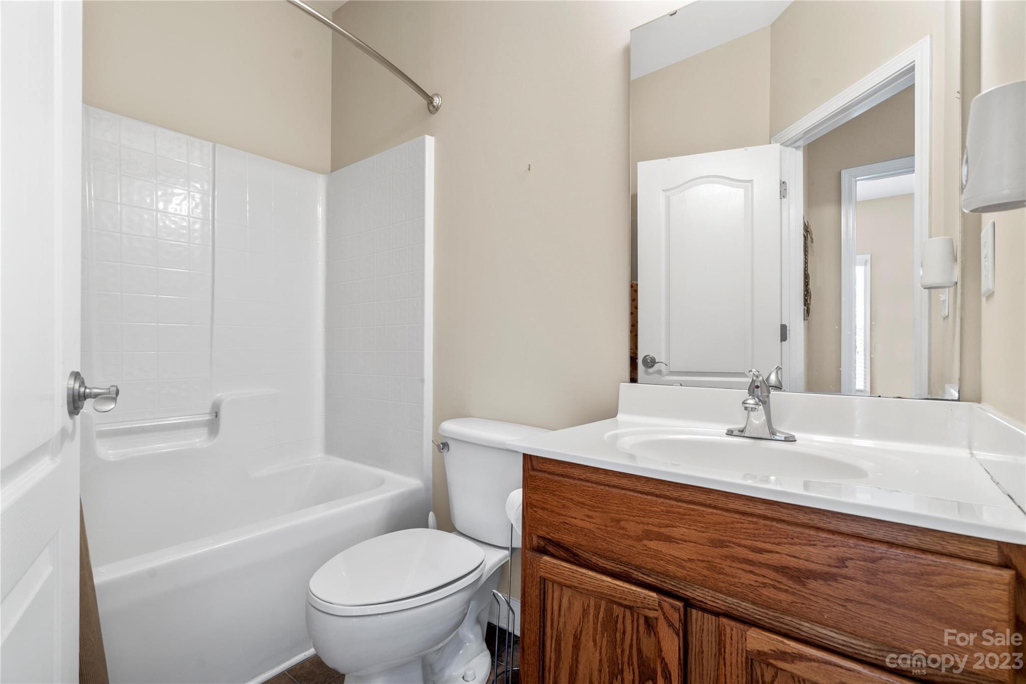 118 Singleton Road Mooresville, NC 28117 - Photo 20 of 28 a bathroom with a sink a toilet and shower