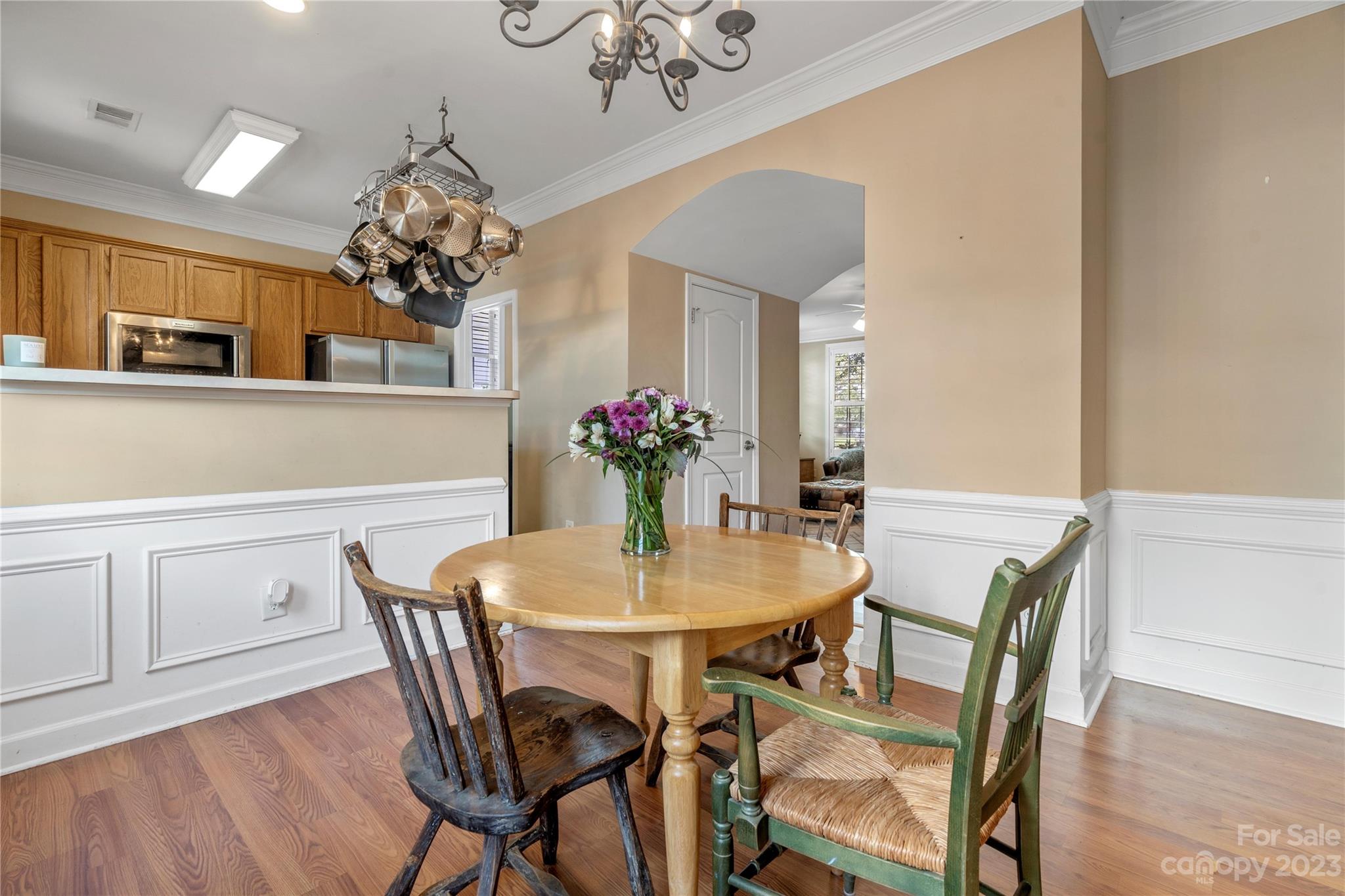 118 Singleton Road Mooresville, NC 28117 - Photo 7 of 28 a view of a dining room with furniture and chandelier