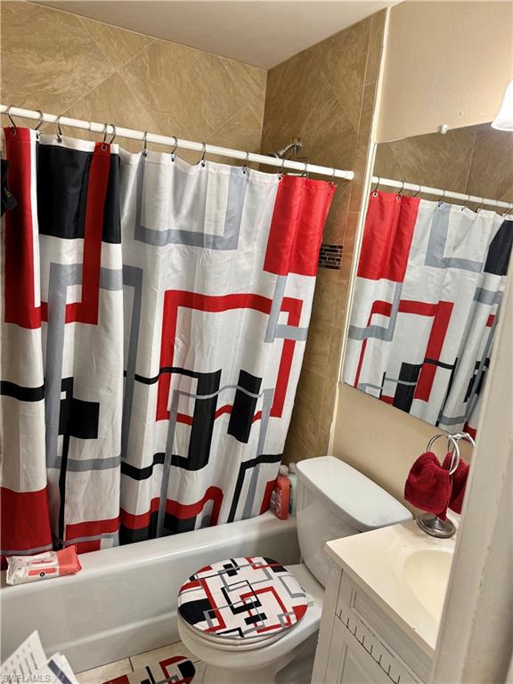 3325 Airport Road North, Unit R6 Naples, FL 34105 - Photo 11 of 11 Bathroom featuring vanity and shower / bath combination with curtain