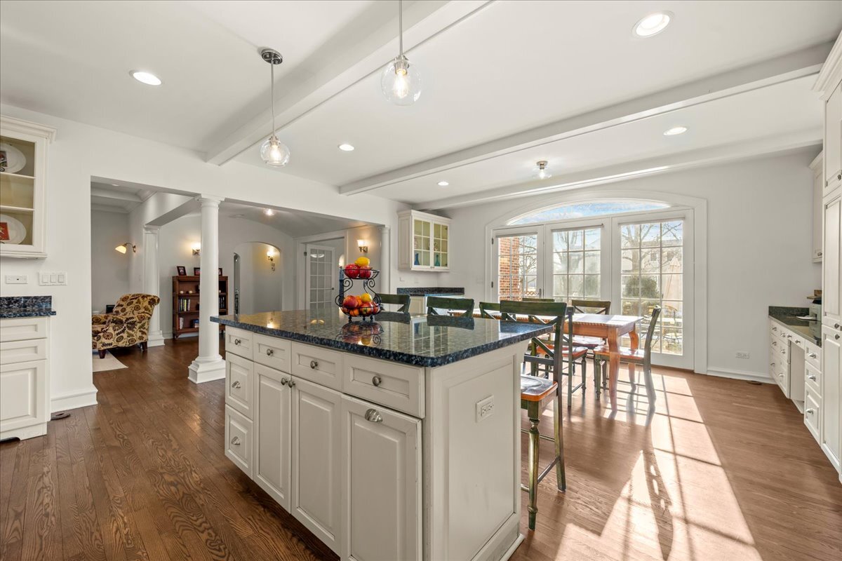 1878 Sunset Road Highland Park, IL 60035 - Photo 12 of 40 a kitchen with lots of counter top space and dining table