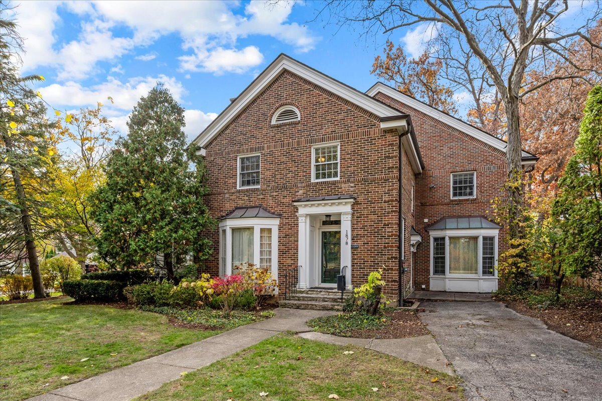 1878 Sunset Road Highland Park, IL 60035 - Photo 2 of 40 a front view of a house with yard and green space