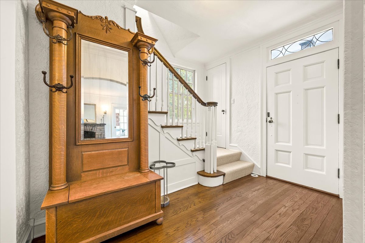 1878 Sunset Road Highland Park, IL 60035 - Photo 3 of 40 a view of an entryway with wooden floor and door