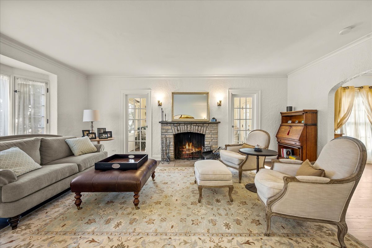 1878 Sunset Road Highland Park, IL 60035 - Photo 4 of 40 a living room with furniture and a fireplace