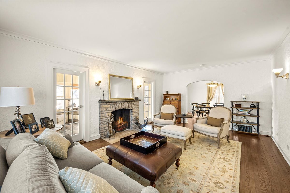 1878 Sunset Road Highland Park, IL 60035 - Photo 5 of 40 a living room with furniture or couch and a fireplace