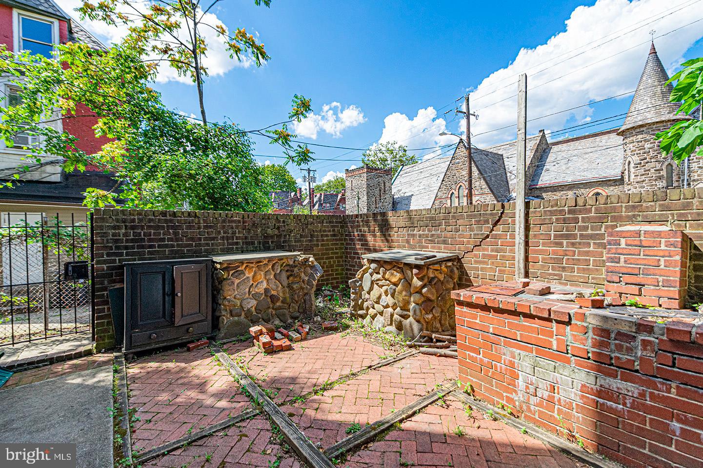 4118 Baltimore Avenue, Unit A Philadelphia, PA 19104 - Photo 5 of 25 a view of a chairs and table in the patio