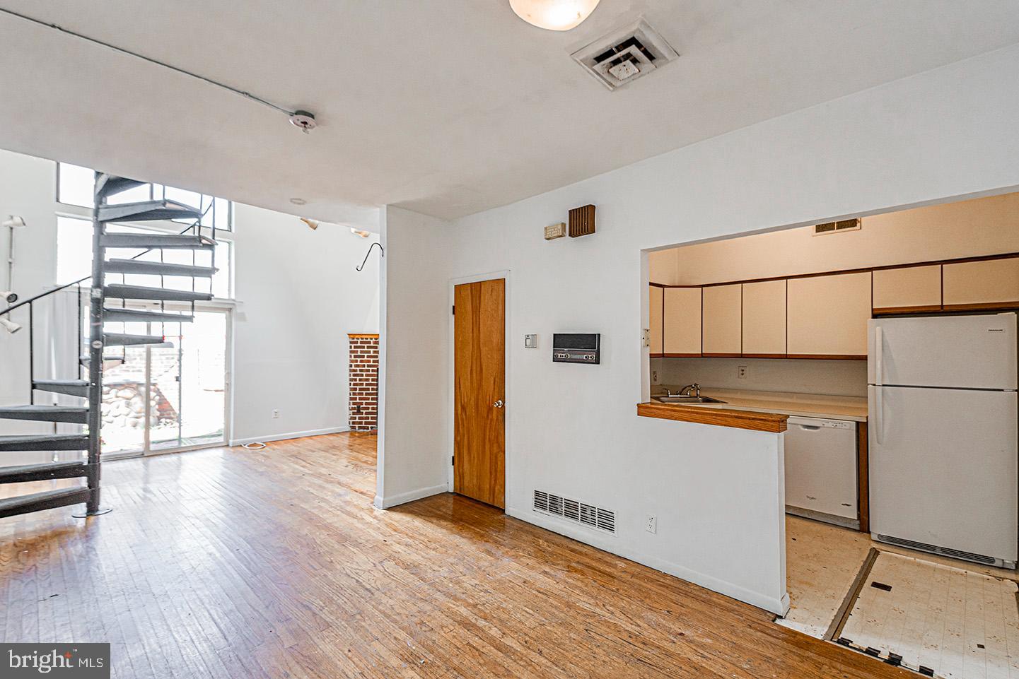 4118 Baltimore Avenue, Unit A Philadelphia, PA 19104 - Photo 7 of 25 a view of a kitchen with wooden floor
