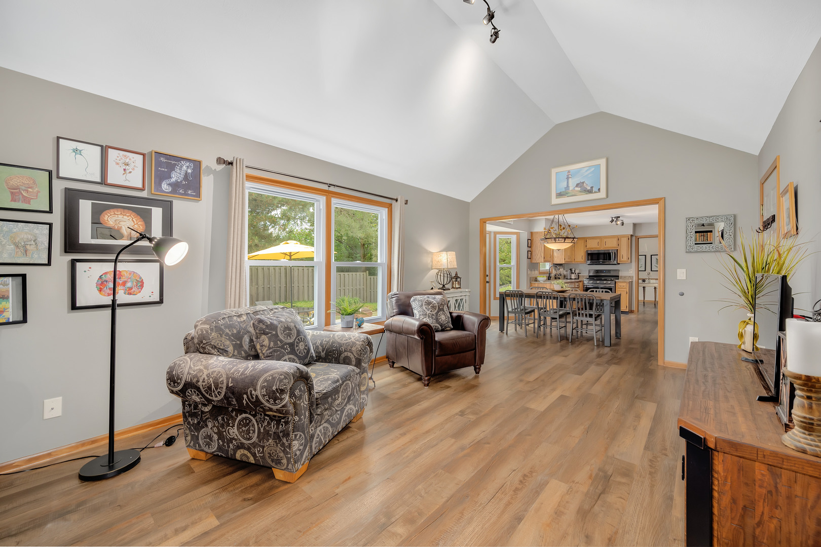 2499 Highland Road Geneva, IL 60134 - Photo 12 of 29 a living room with furniture and a flat screen tv
