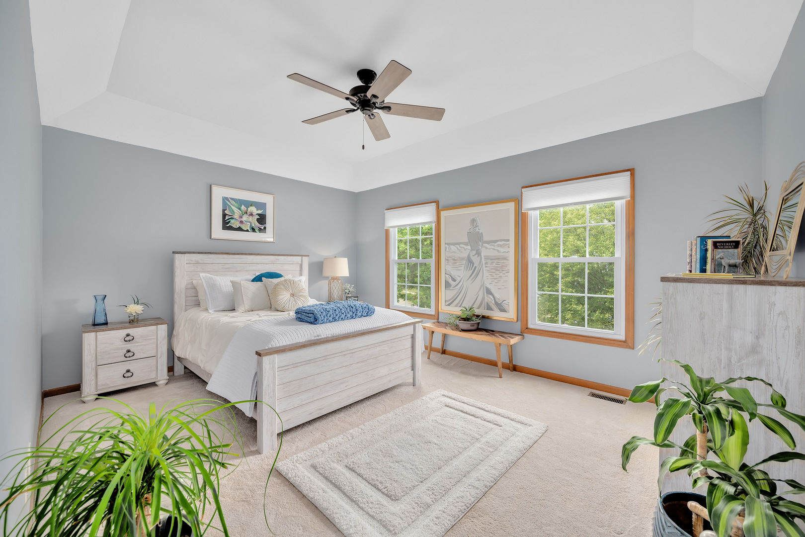 2499 Highland Road Geneva, IL 60134 - Photo 18 of 29 a spacious bedroom with a bed a chandelier and a window