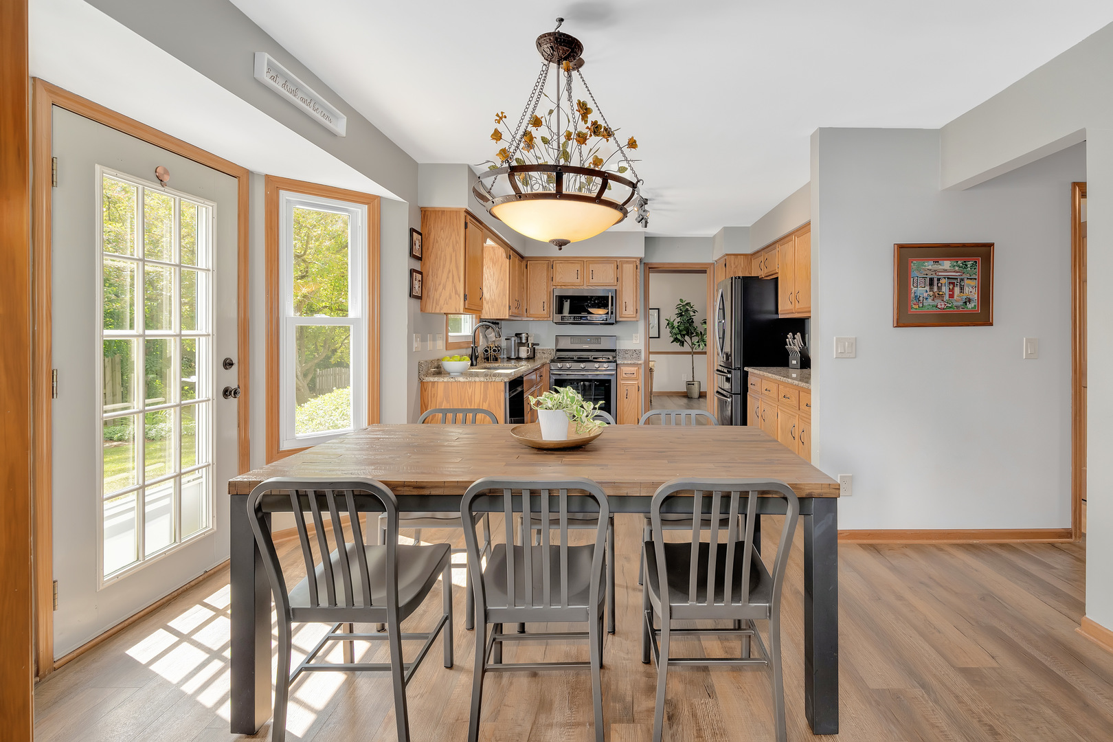 2499 Highland Road Geneva, IL 60134 - Photo 8 of 29 a view of a dining room with furniture window and wooden floor