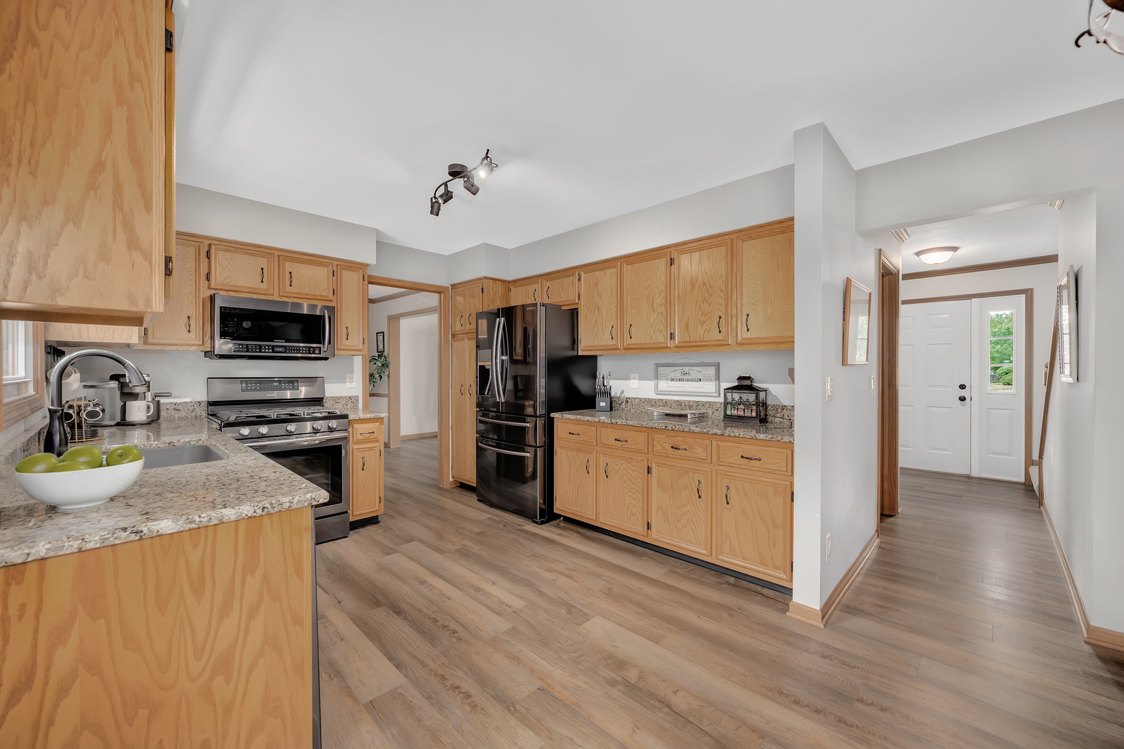 2499 Highland Road Geneva, IL 60134 - Photo 9 of 29 a kitchen with a refrigerator stove and sink