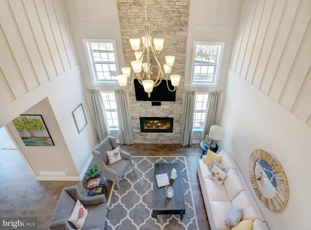 a white bath tub sitting next to a white sink