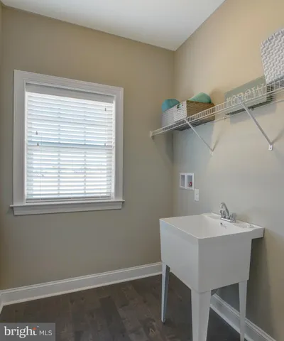 a white bath tub sitting in a bathroom