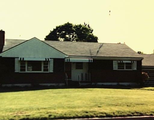 a front view of house with yard