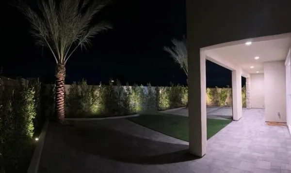 a kitchen that has a sink and a stove