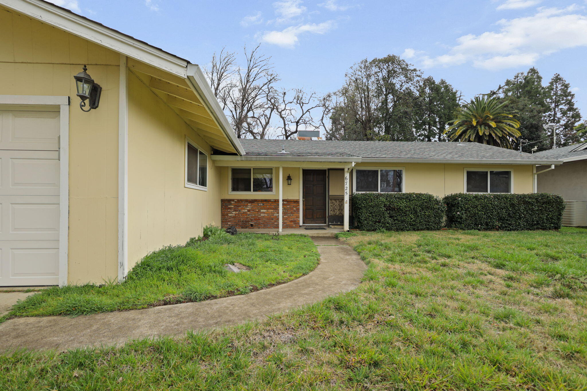 6725 Reflection Street Redding, CA 96001 - Photo 2 of 20 a view of outdoor space yard and front view of a house
