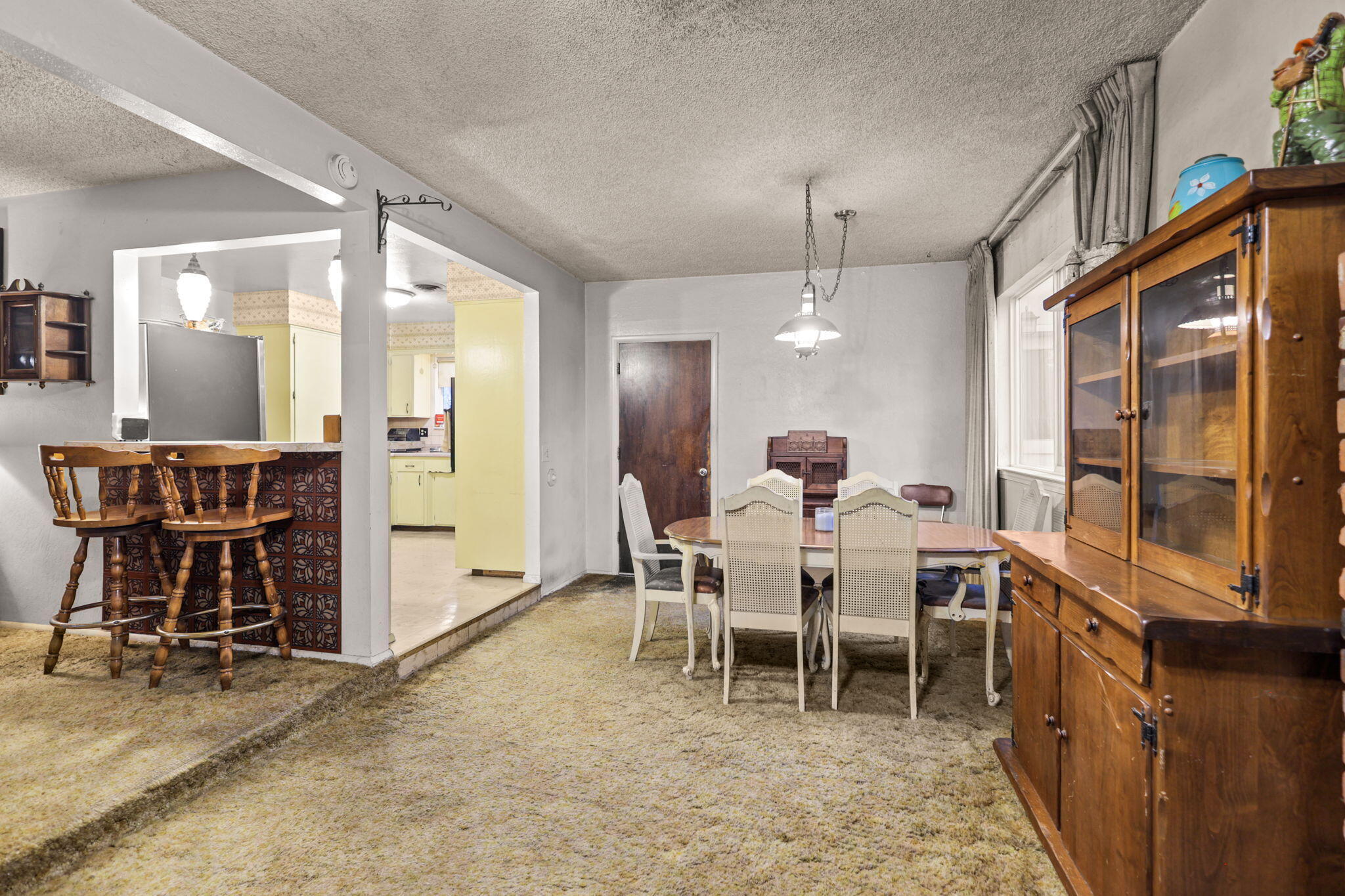6725 Reflection Street Redding, CA 96001 - Photo 6 of 20 a view of a dining room with furniture