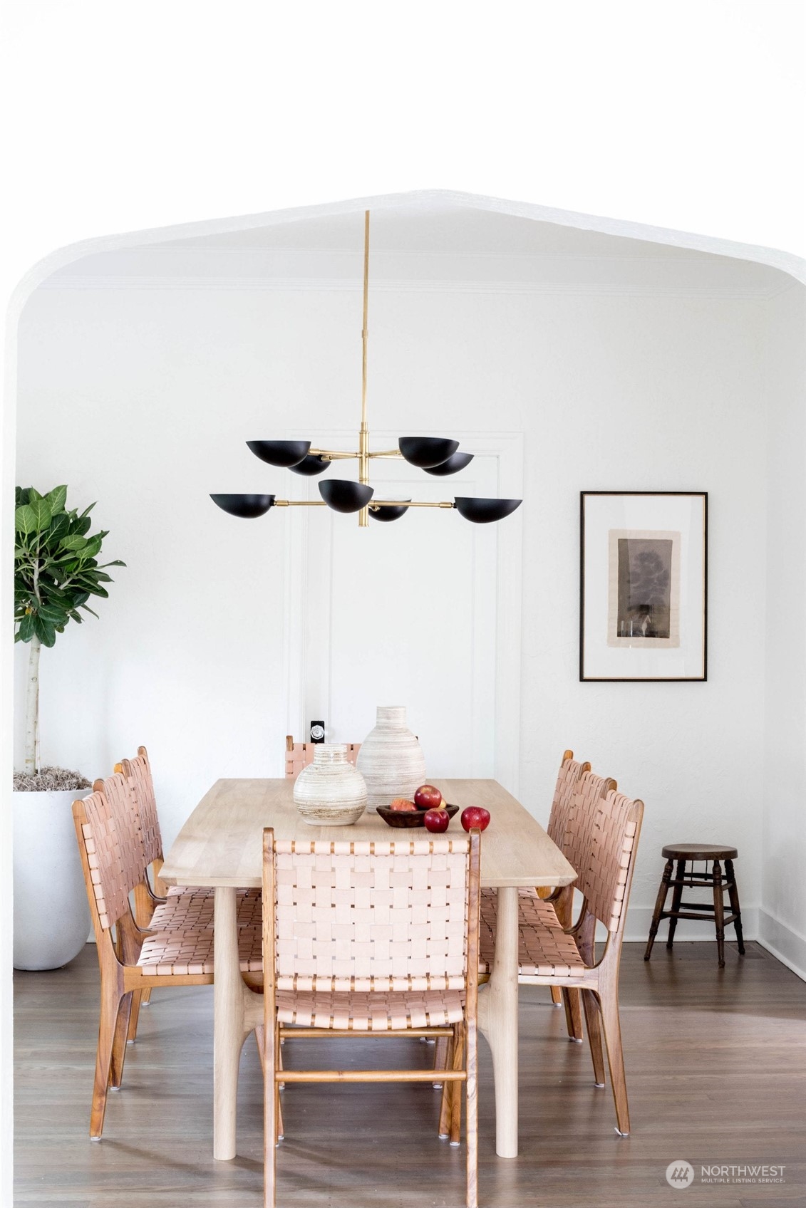 2114 North 65th Street Seattle, WA 98103 - Photo 13 of 40 a dining room with furniture a chandelier and wooden floor
