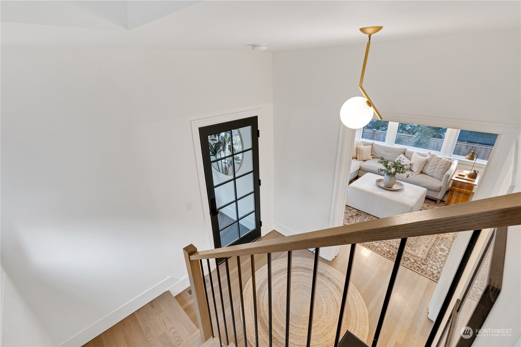 2114 North 65th Street Seattle, WA 98103 - Photo 27 of 40 a view of a hallway with windows
