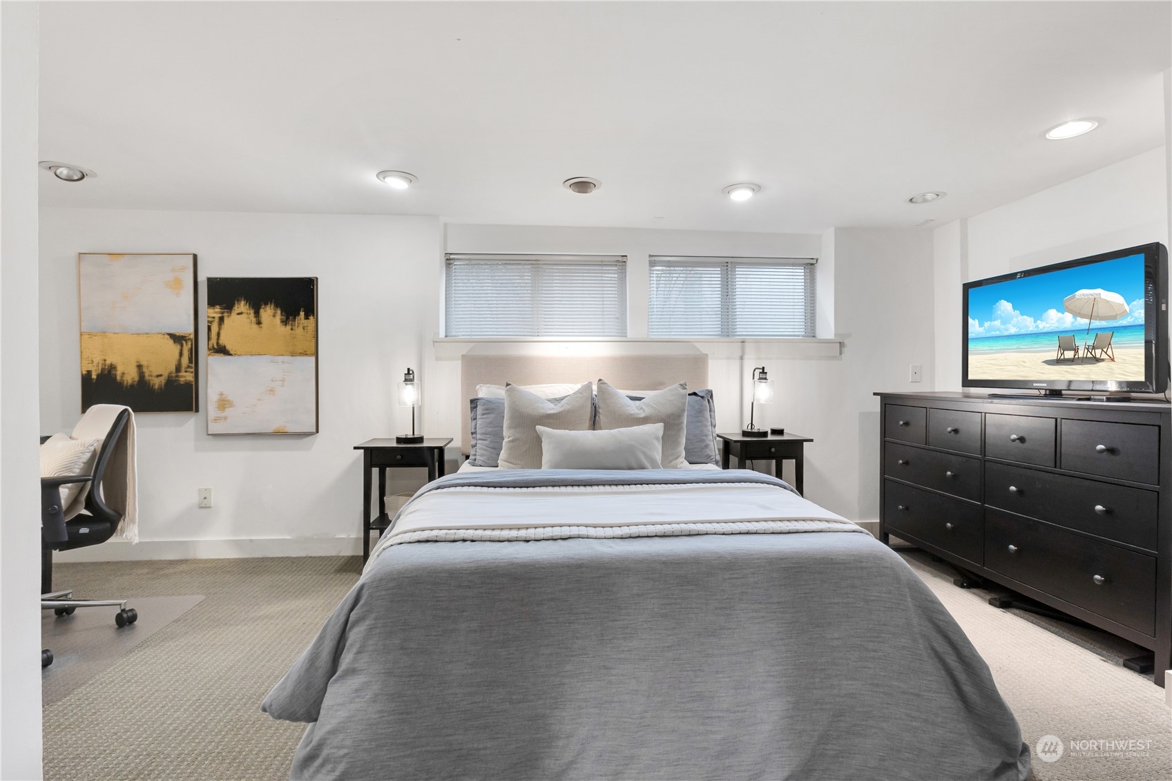 2114 North 65th Street Seattle, WA 98103 - Photo 30 of 40 a bedroom with a bed and a night stand