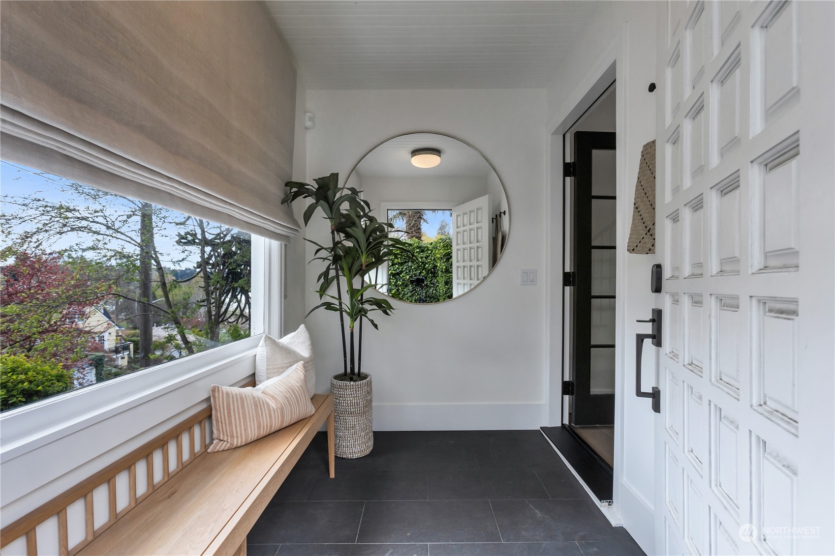 2114 North 65th Street Seattle, WA 98103 - Photo 3 of 40 a living room with furniture and a large window