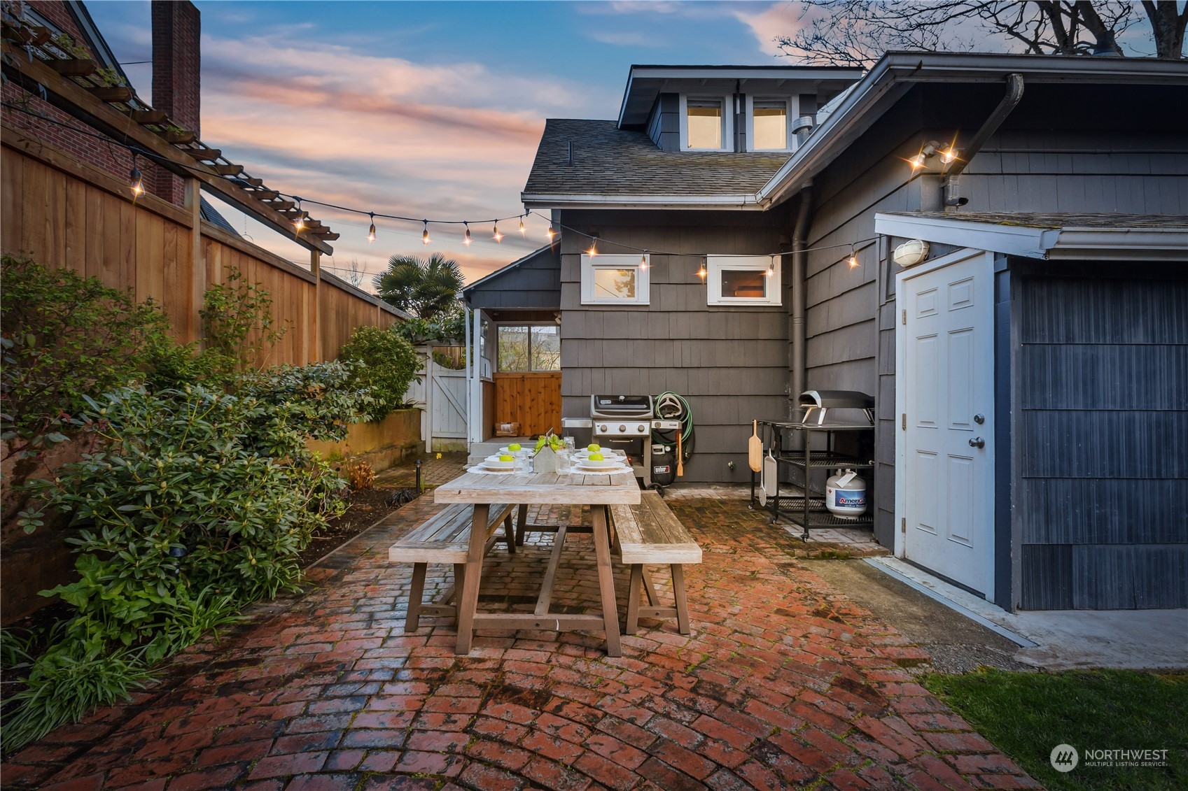 2114 North 65th Street Seattle, WA 98103 - Photo 35 of 40 a front view of a house with yard