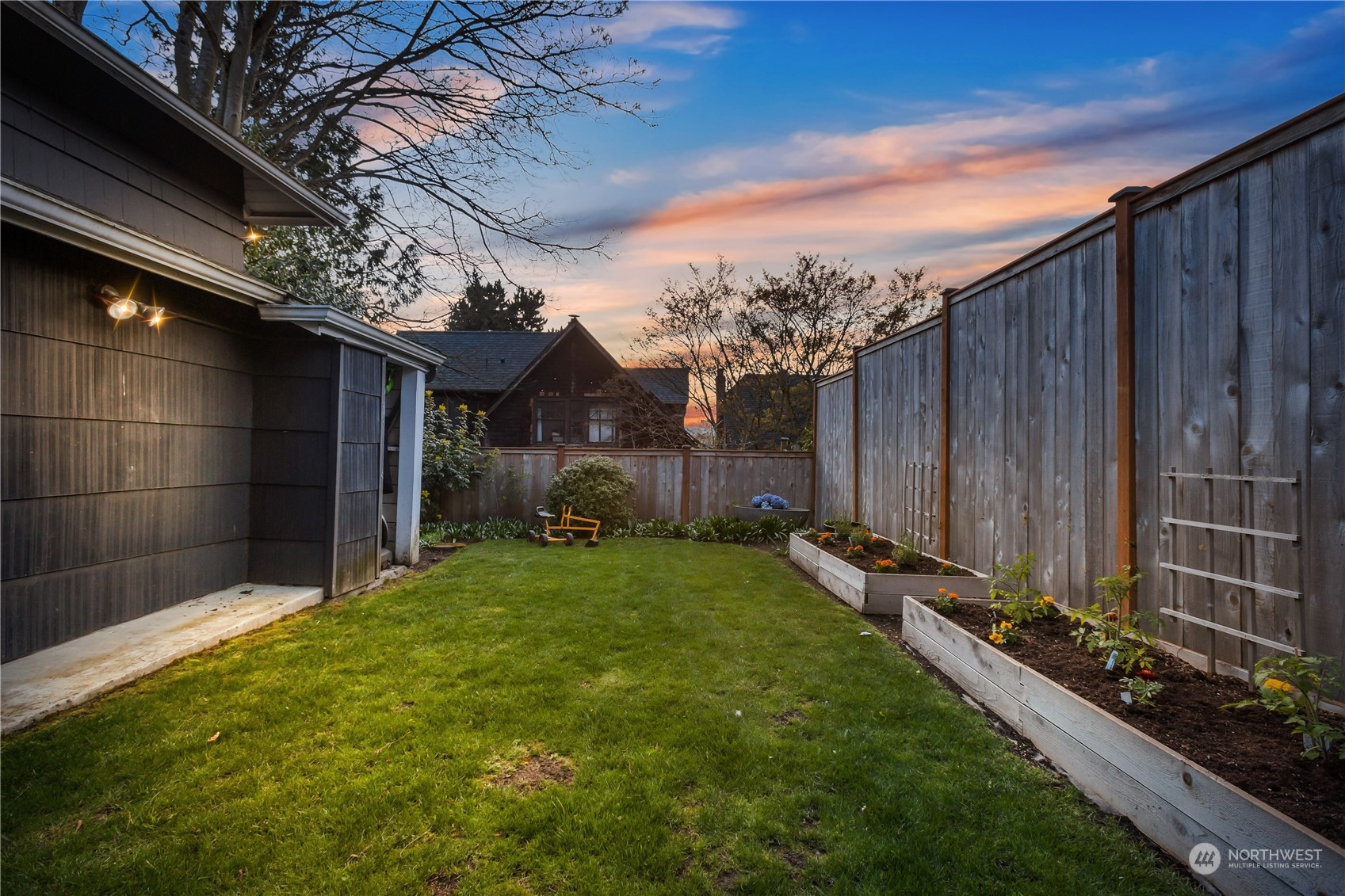 2114 North 65th Street Seattle, WA 98103 - Photo 37 of 40 a view of a back yard of the house