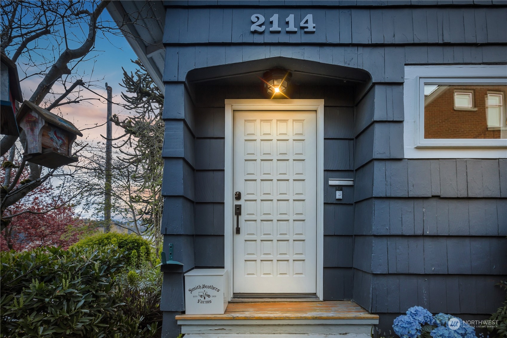 2114 North 65th Street Seattle, WA 98103 - Photo 40 of 40 a view of door with wooden wall