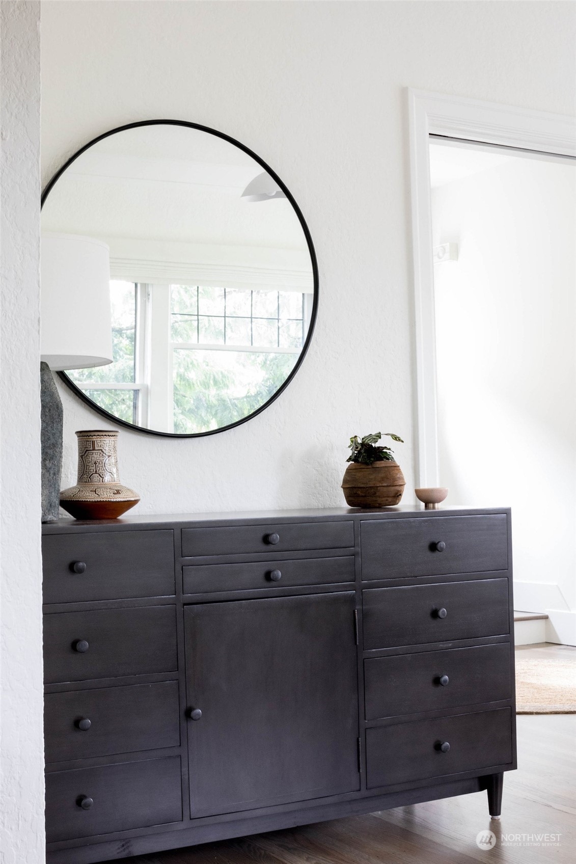 2114 North 65th Street Seattle, WA 98103 - Photo 9 of 40 a bathroom with a sink and a mirror