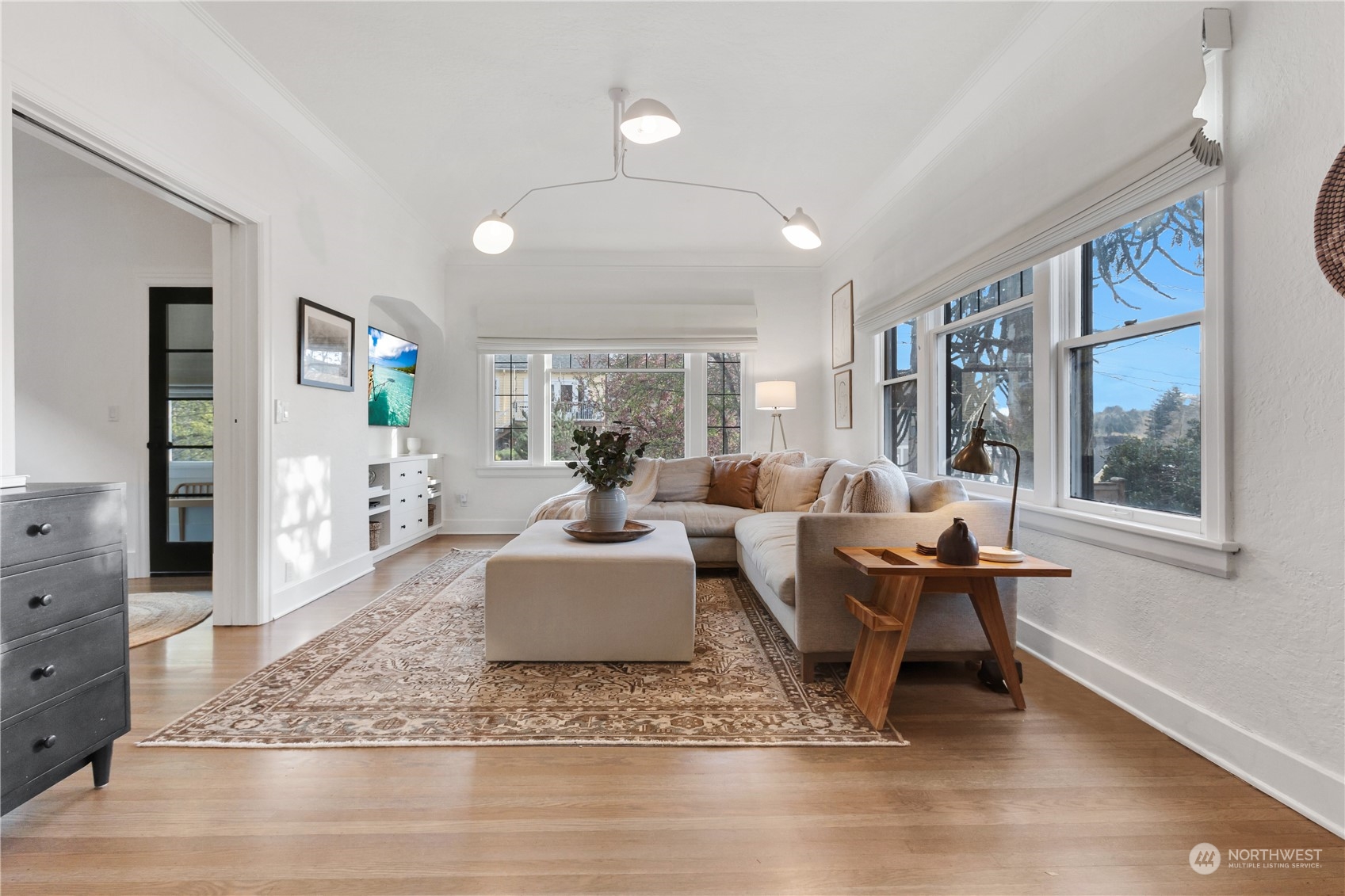 2114 North 65th Street Seattle, WA 98103 - Photo 10 of 40 a living room with furniture and a large window