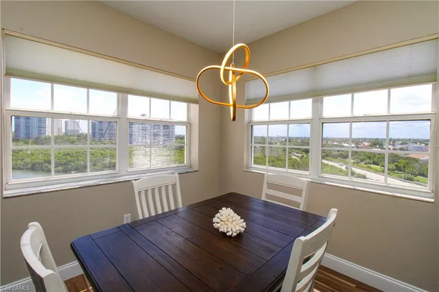a workspace with furniture and window