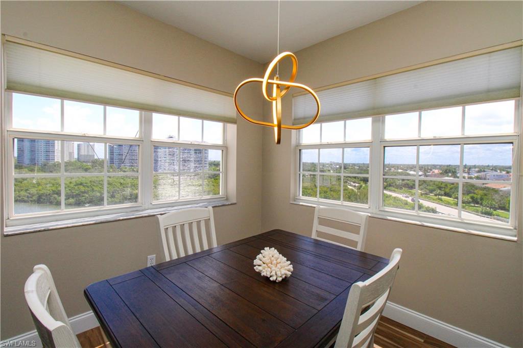 35 Bluebill Avenue, Unit B702 Naples, FL 34108 - Photo 30 of 50 a workspace with furniture and window