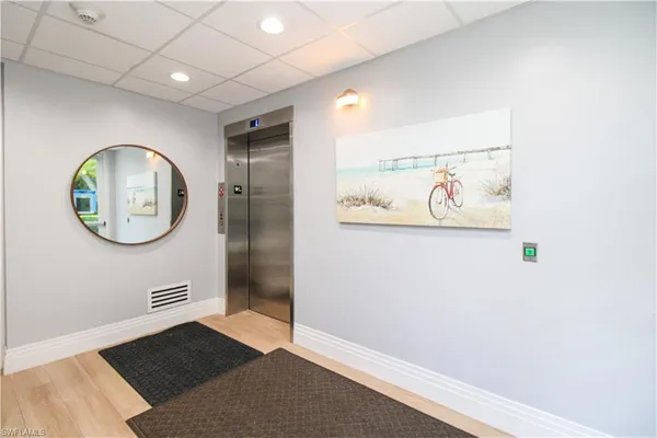 a view of a hallway with elevator