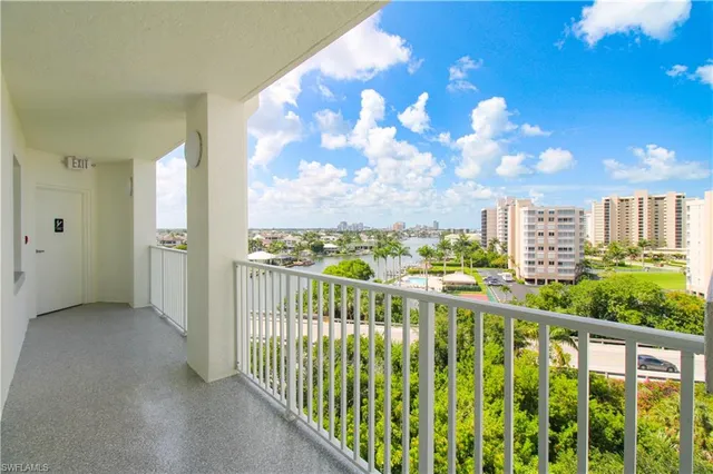 a view of a balcony with city view