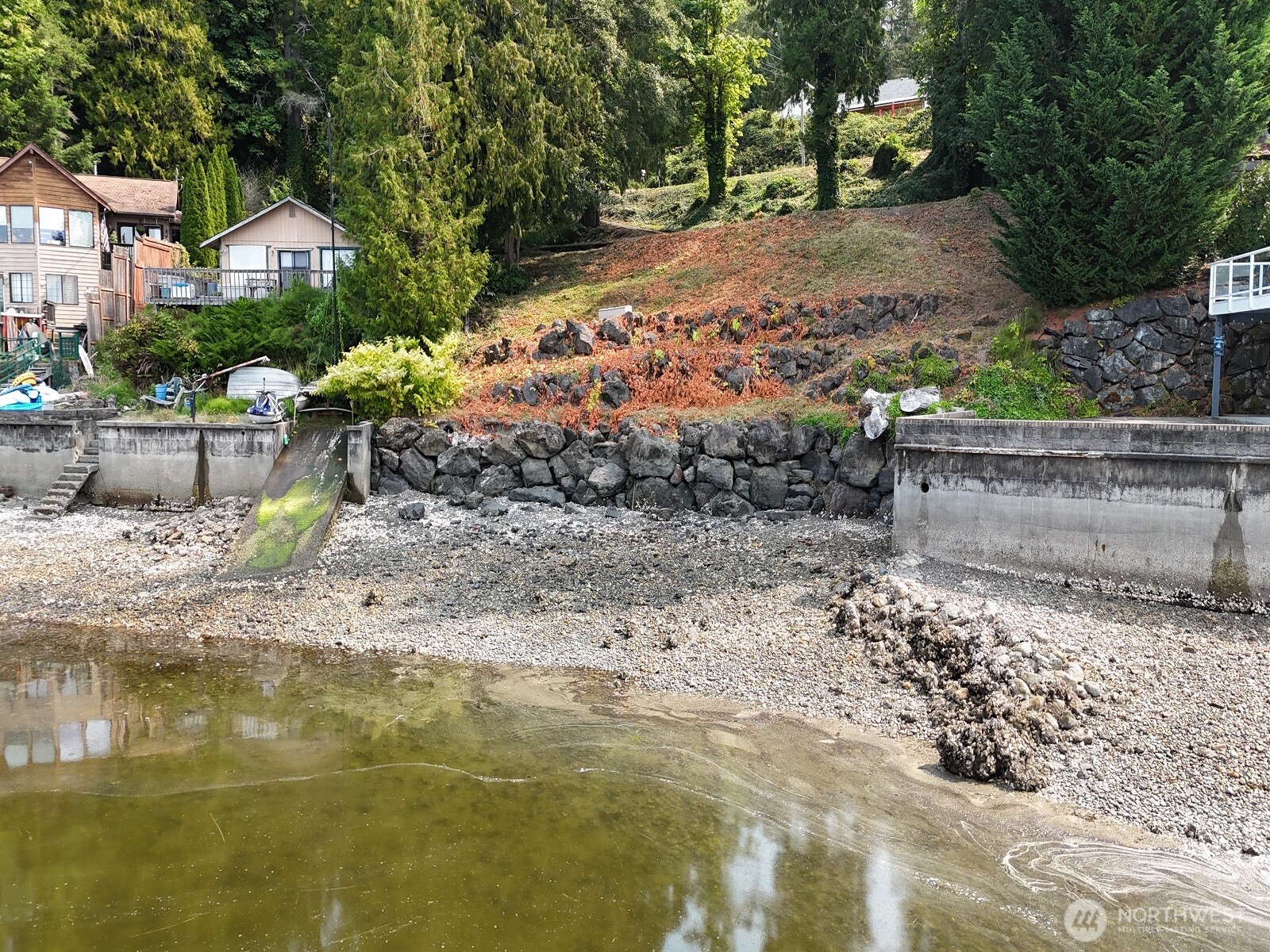 17871 Highway 106 Belfair, WA 98528 - Photo 2 of 18 a view of a garden with a fountain