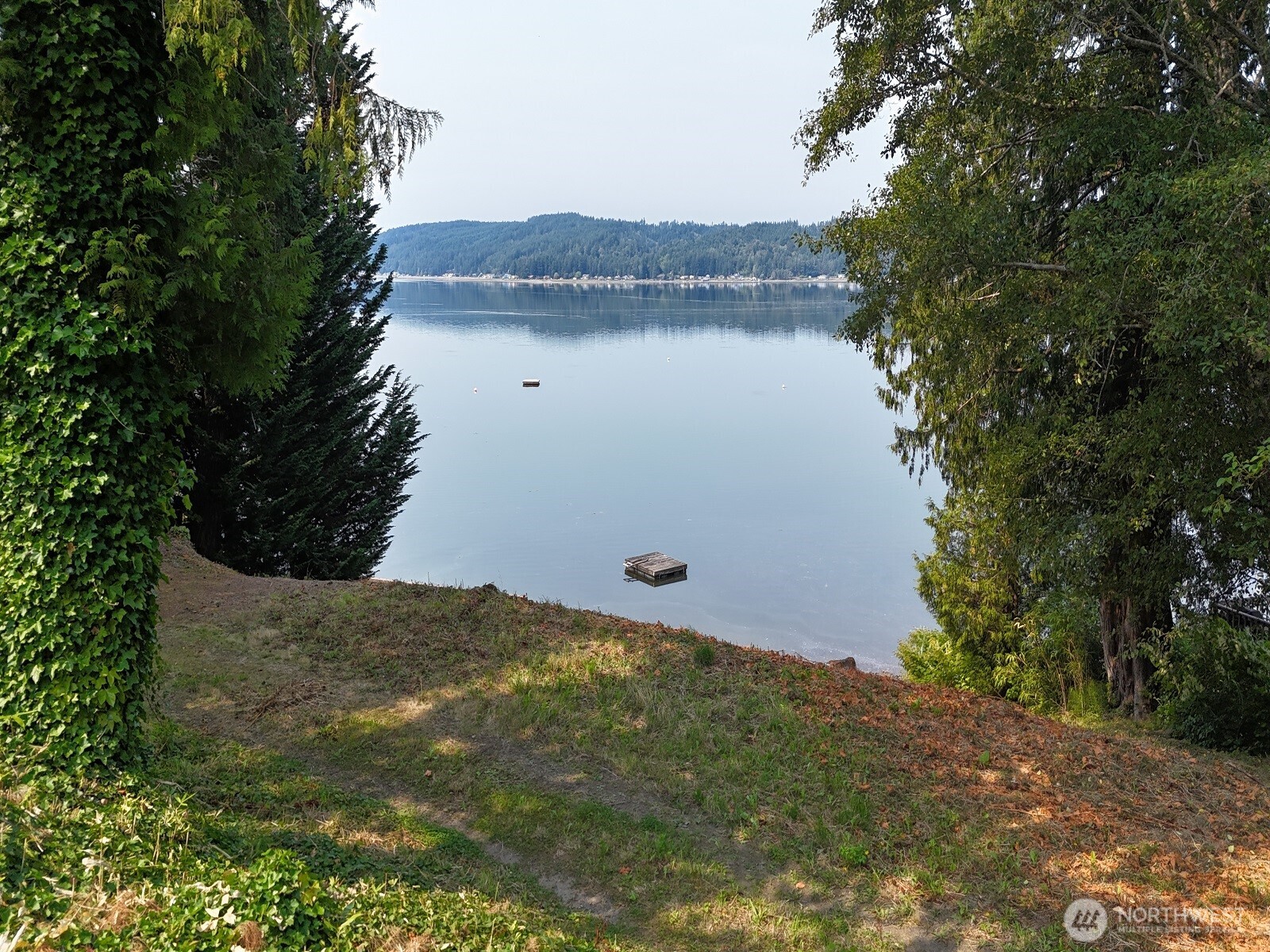 17871 Highway 106 Belfair, WA 98528 - Photo 4 of 18 a view of a house with a yard