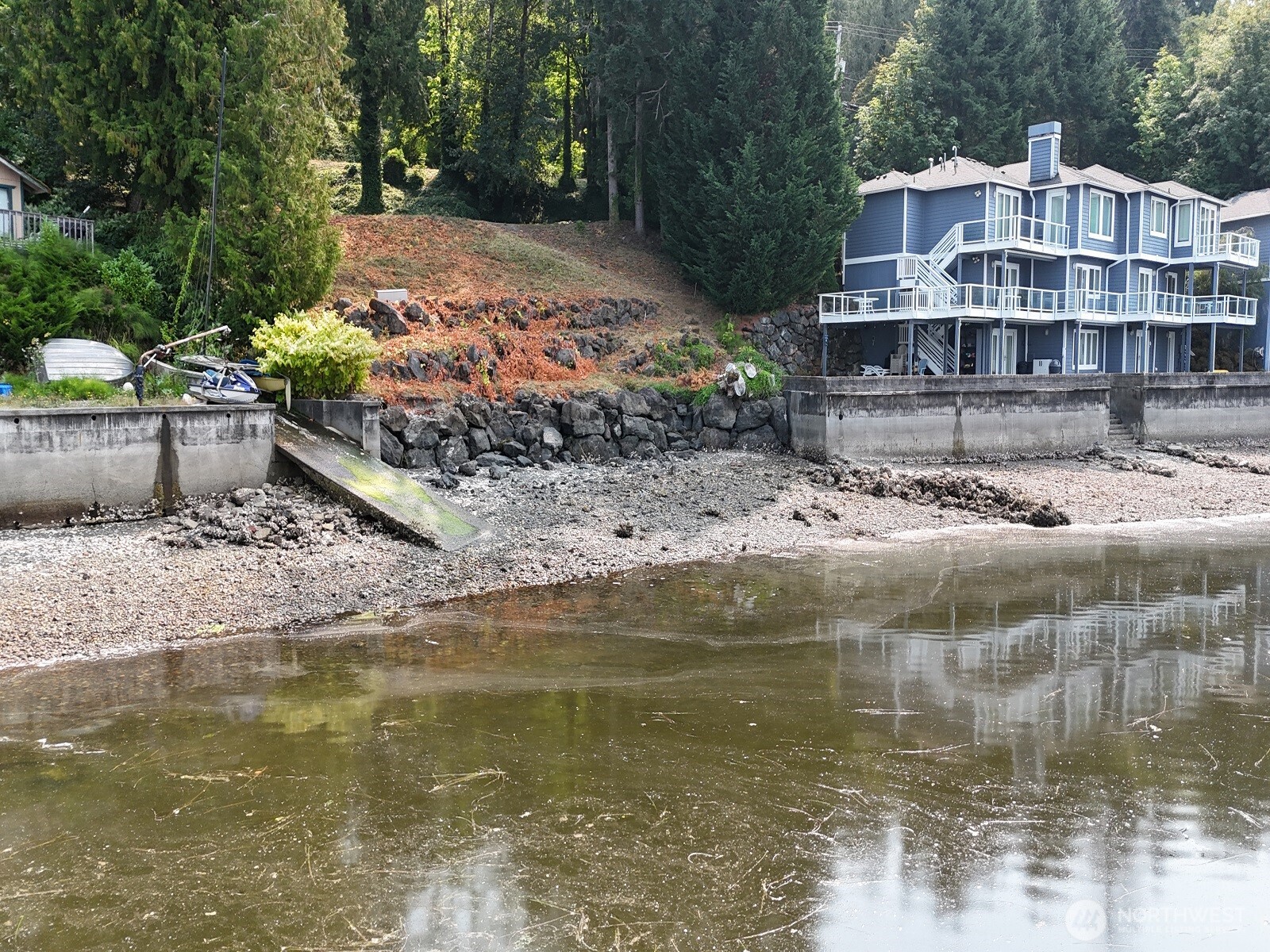17871 Highway 106 Belfair, WA 98528 - Photo 5 of 18 a front view of a house with a yard