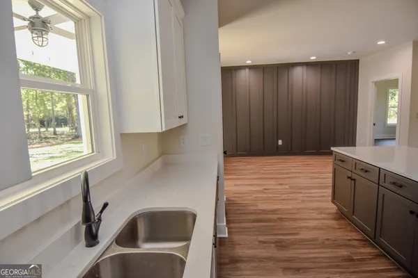 a white bath tub sitting in a bathroom