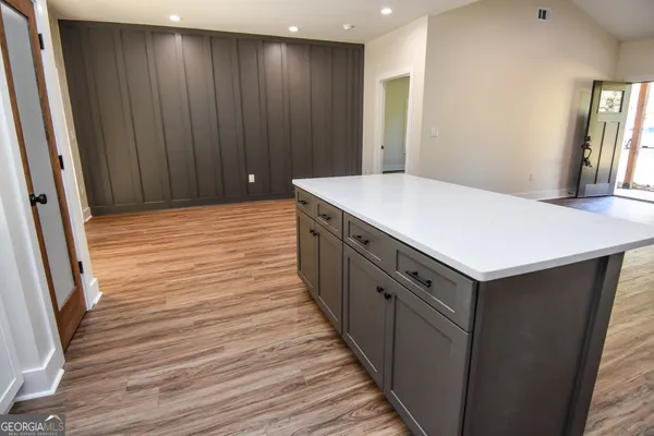 a white bath tub sitting in a bathroom