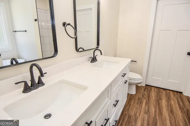 front view of a house with a trees